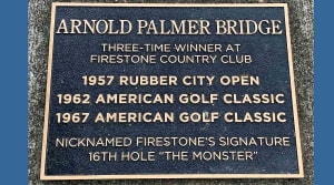 The plaque on the Arnold Palmer Bridge at Firestone CC.